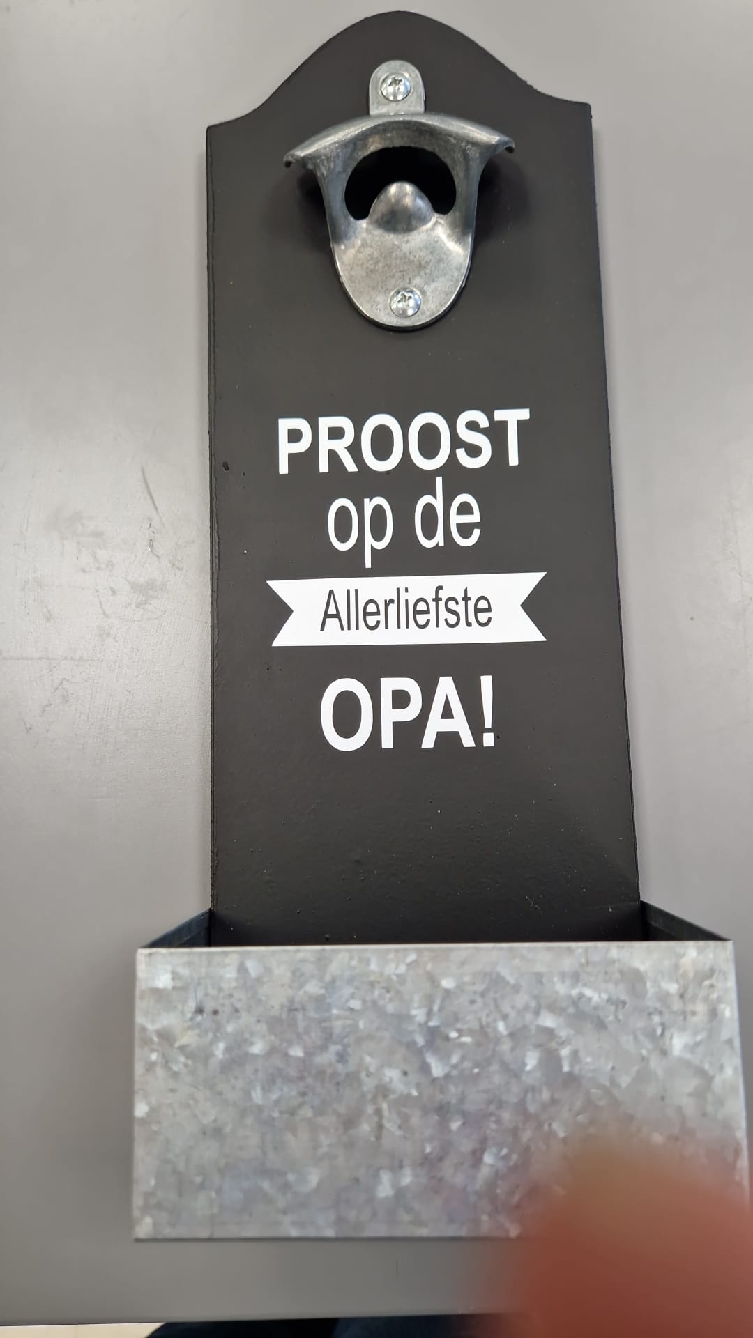 Opener met opvangbakje